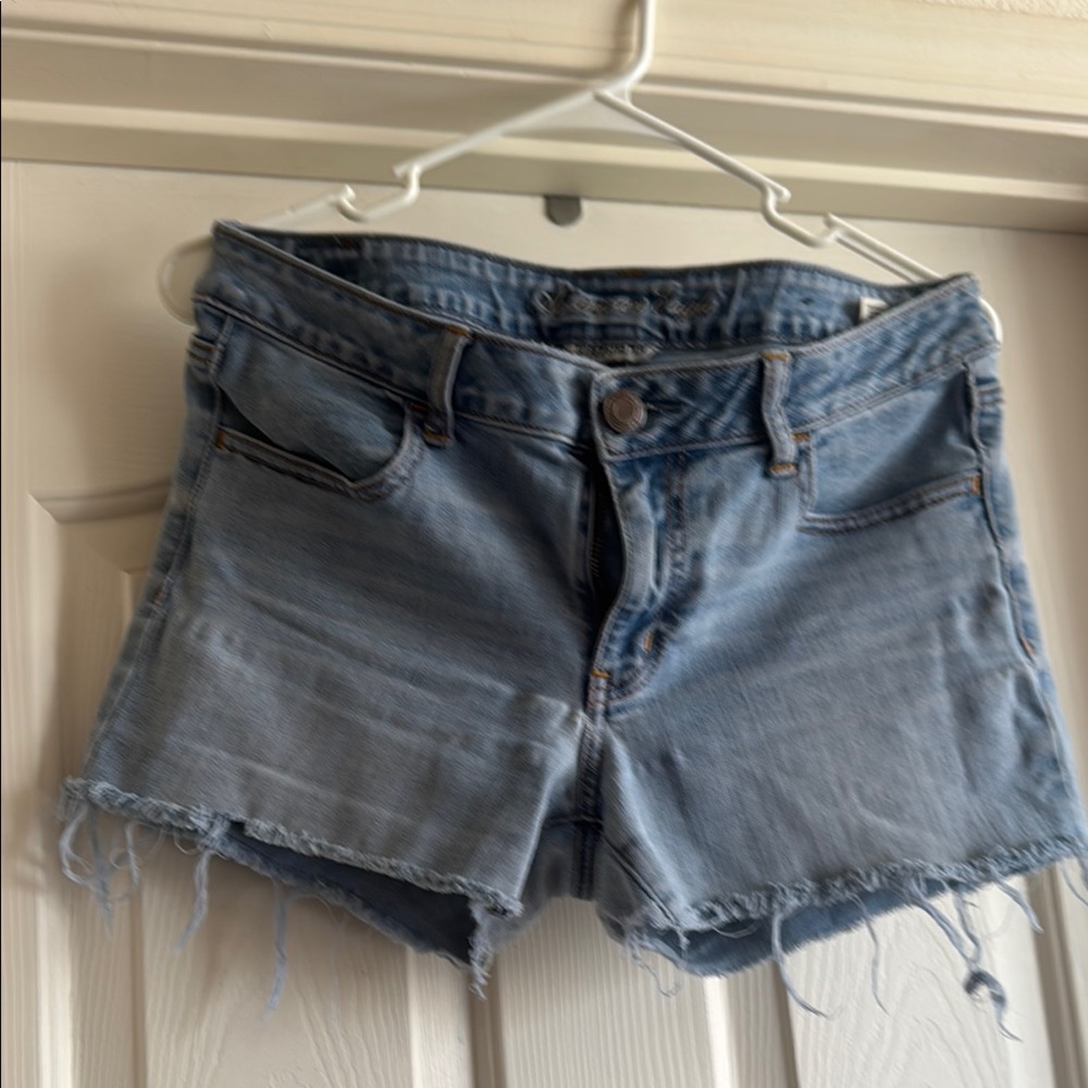 Blue Jean Shorts with Frayed Hem and Relaxed Fit